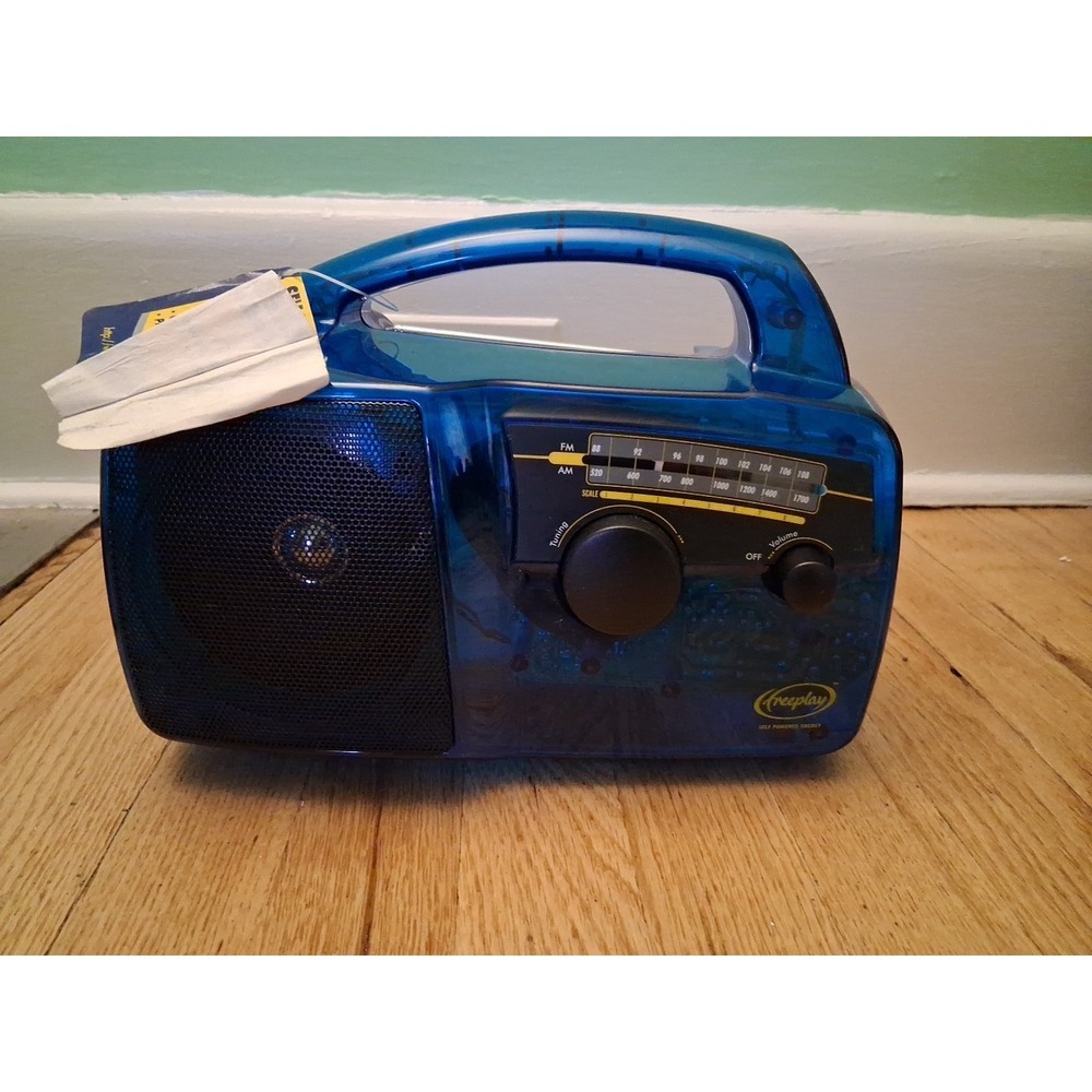 Freeplay Plus Self Powered AM/FM Radio Solar Power Wind Up w/ Light